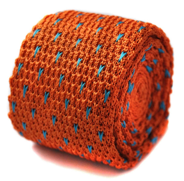 orange skinny knitted tie with light  blue pin spots